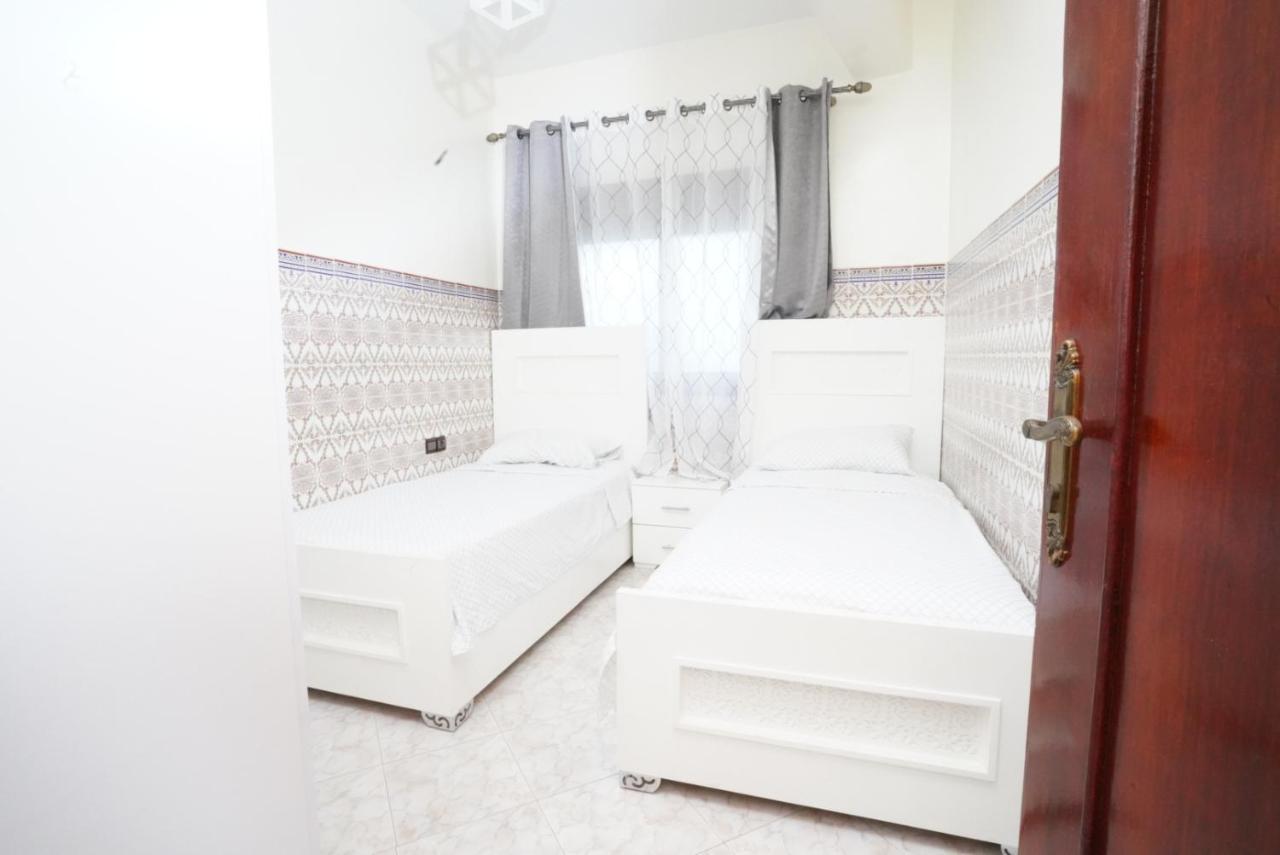 Apartment Oumnia 1 - City Center Tangier Bagian luar foto